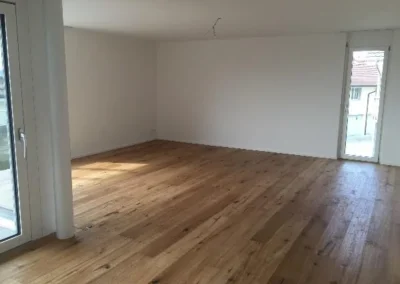 Zimmer mit geräucherter Eichendiele in der Wohnüberbauung Oberwil Pfäffikon ZH